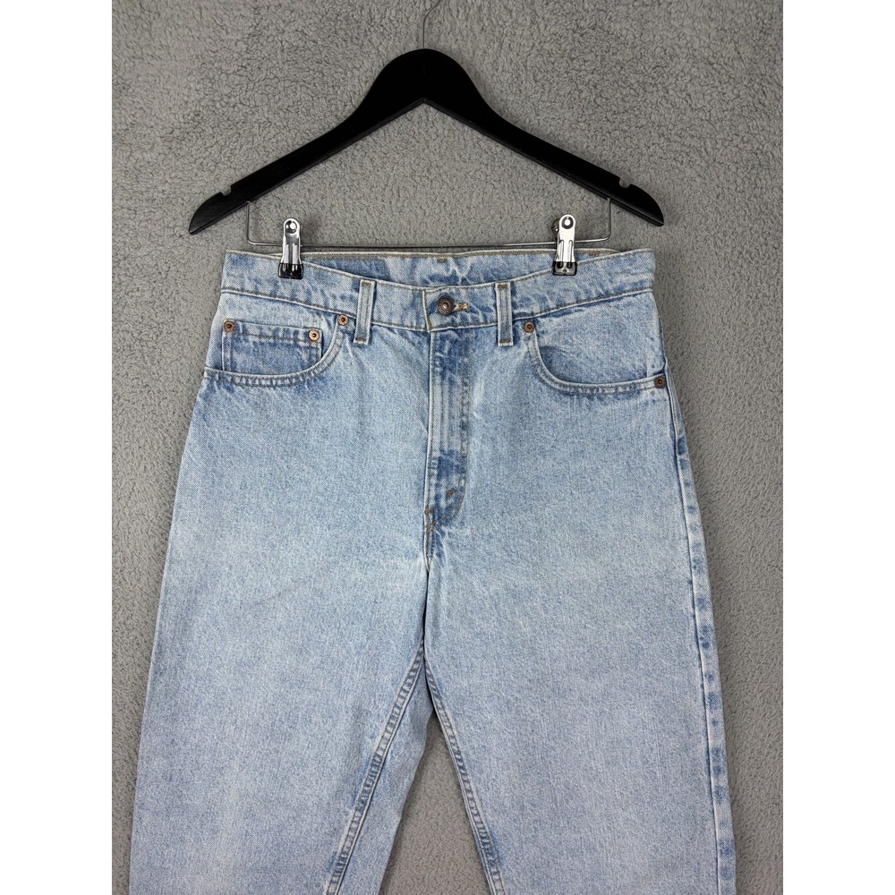 Vintage Levis 550 Jeans Womens 34x32 Blue Light Relaxed Tapered Made USA Raw Hem